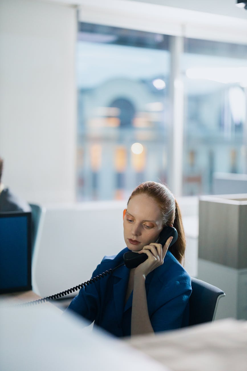 employee talking on telephone
